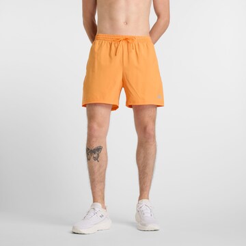 Regular Pantalon de sport 'Essentials' new balance en orange : devant