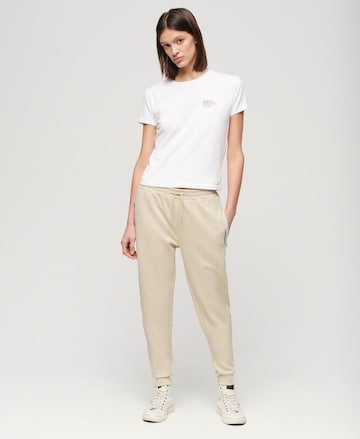 Coupe slim Pantalon de sport Superdry en beige