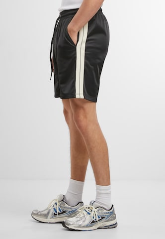 Regular Pantalon Urban Classics en noir