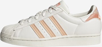 Baskets basses ADIDAS ORIGINALS en blanc