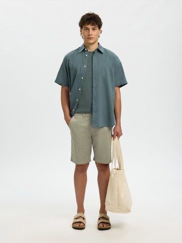 Coupe slim Pantalon chino 'SLHMILES' SELECTED en vert