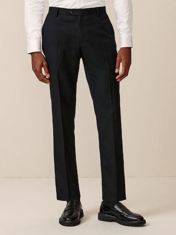 Skinny Pantaloni con piega frontale di Next in nero: frontale