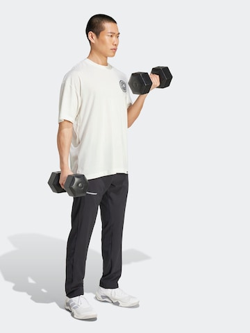 ADIDAS PERFORMANCE Функционална тениска 'GFX GLOB Q3' в бяло