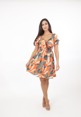 Elara Kjole i orange