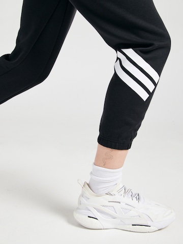 ADIDAS SPORTSWEAR Tapered Sports trousers 'Future Icons' in Black