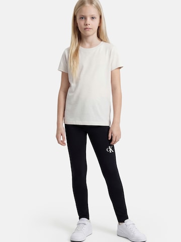 Calvin Klein Jeans - Skinny Leggings em preto: frente