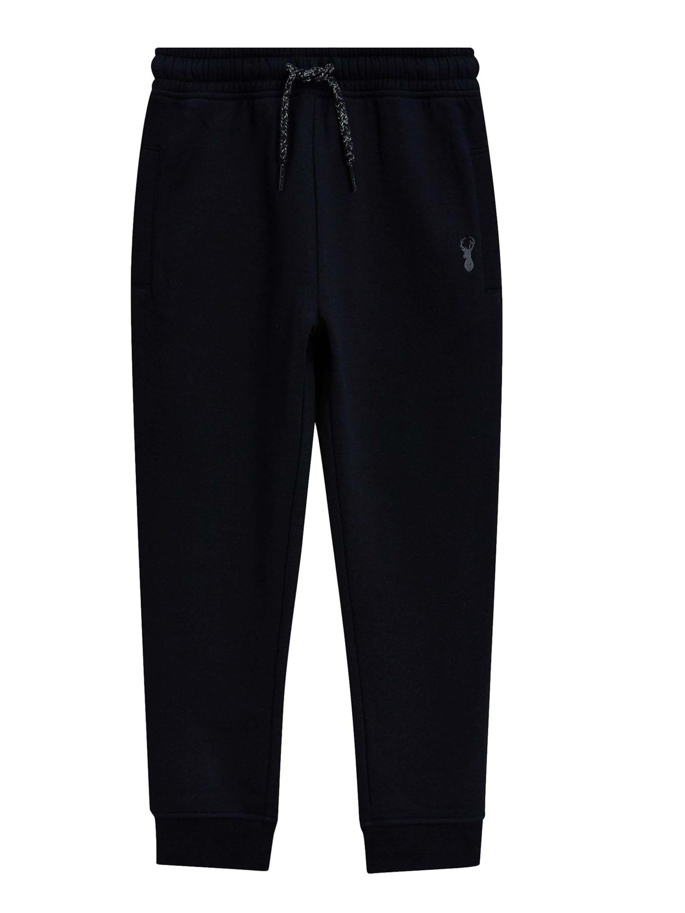 Next Tapered Trousers in Black: front
