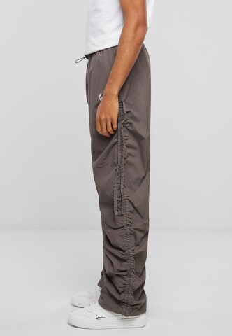 Karl Kani Regular Cargo trousers in Grey