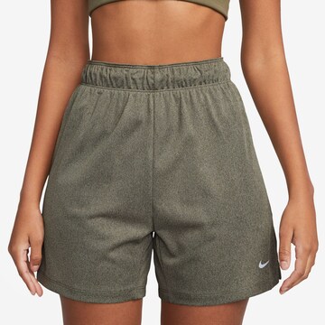 NIKE Regular Workout Pants in Green: front