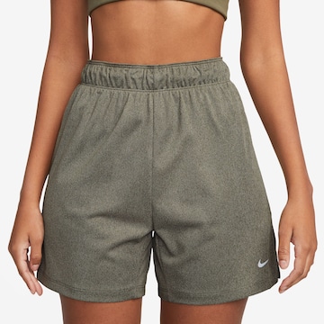 NIKE Workout Pants in Green: front