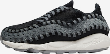 Baskets basses 'AIR FOOTSCAPE WOVEN' Nike Sportswear en noir : devant