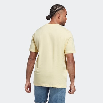 ADIDAS ORIGINALS Koszulka 'Trefoil Essentials' w kolorze żółty