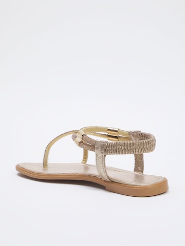 Trendyol T-bar sandals in Gold