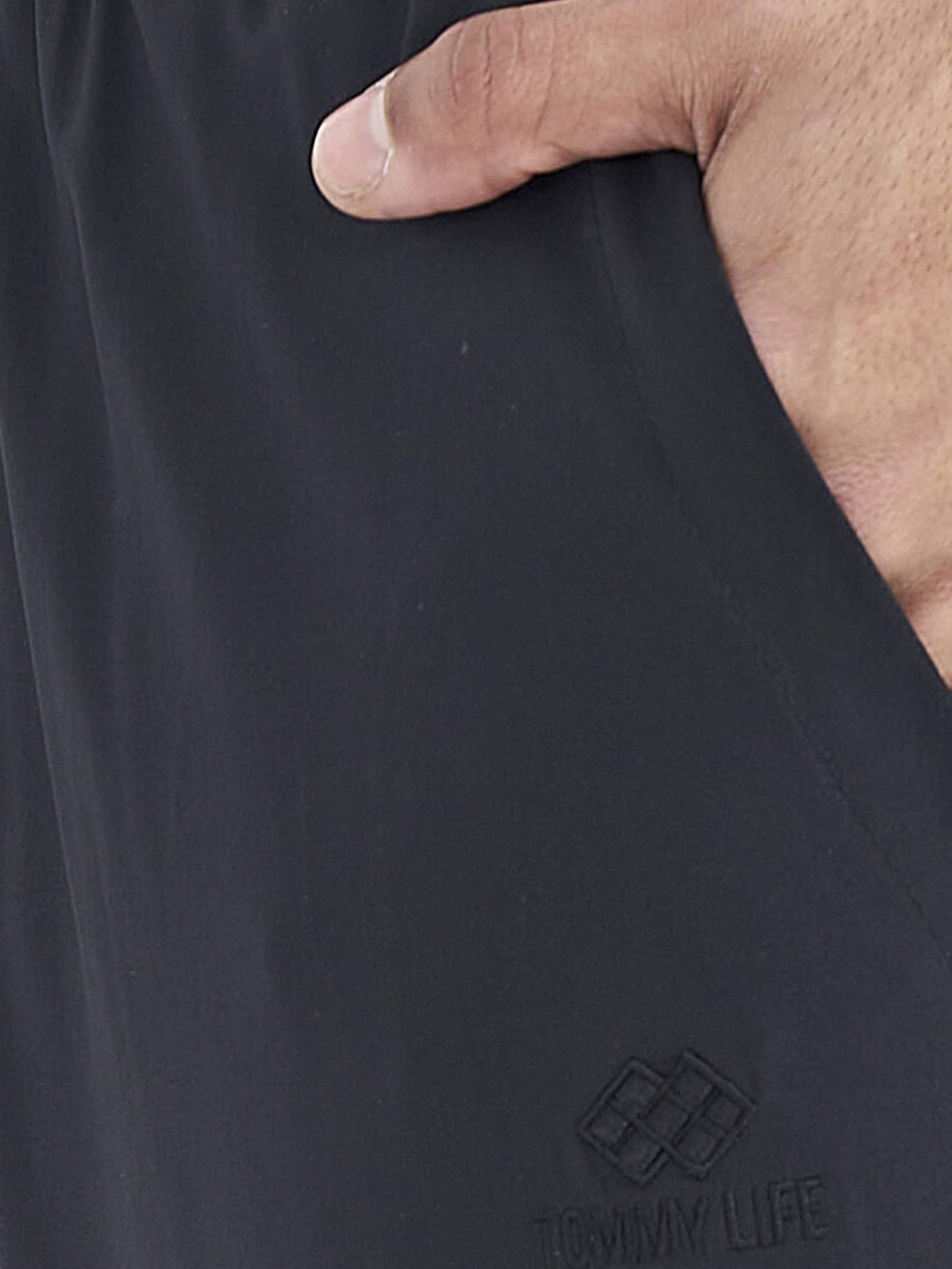 Wide leg Pantaloni di Tommy Life in nero