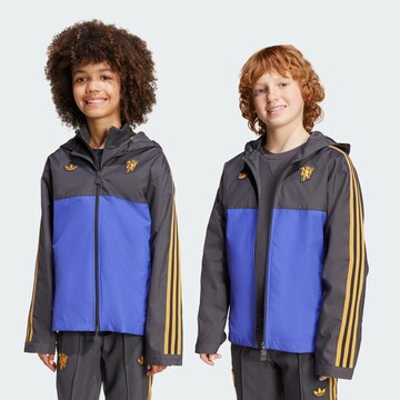 Veste mi-saison 'Manchester United Terrace Icons' ADIDAS ORIGINALS en noir