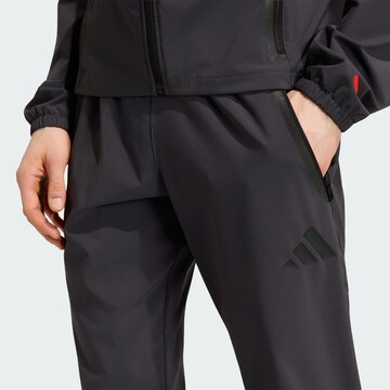 ADIDAS PERFORMANCE Tapered Sports trousers 'Audi Formula One Team DNA' in Black