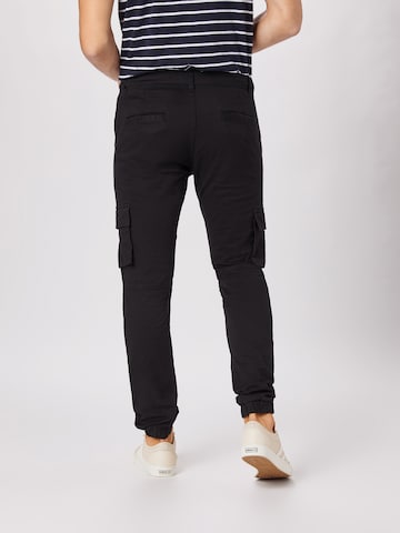 Effilé Pantalon cargo Denim Project en noir