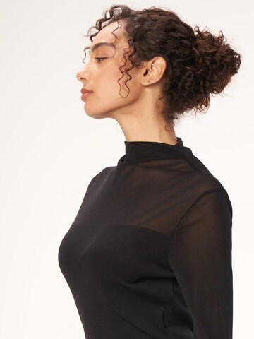 Haut 'Chic High Neck Sheer Mesh Long Sleeve Top - Black' yoligex en noir