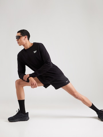 ReebokTehnička sportska majica - crna boja