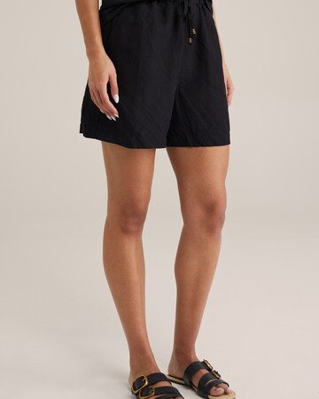 WE Fashion Loosefit Παντελόνι σε μαύρο