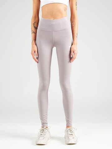 Skinny Pantalon de sport 'Motion EMEA' UNDER ARMOUR en gris : devant