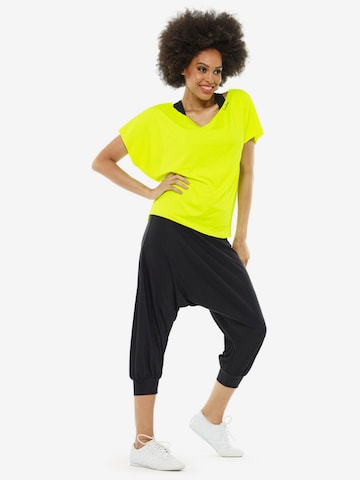 Winshape - Camiseta funcional 'DT101' en amarillo