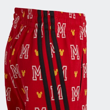ADIDAS SPORTSWEAR Slimfit Sportovní kalhoty 'Disney Mickey Mouse' – červená