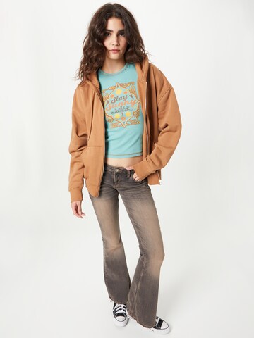 BDG Urban Outfitters Tričko 'STAY SUNNY BABY' – modrá