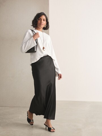 Next Rok in Zwart