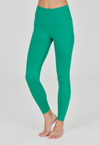 Athlecia Slim fit Workout Pants 'Franz' in Green: front