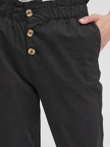 Tapered Pantaloni di Oxmo in nero