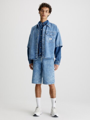 Calvin Klein Jeans Lużny krój Spodnie w kolorze niebieski