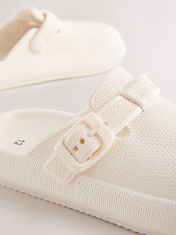 Sandale de la Next pe bej