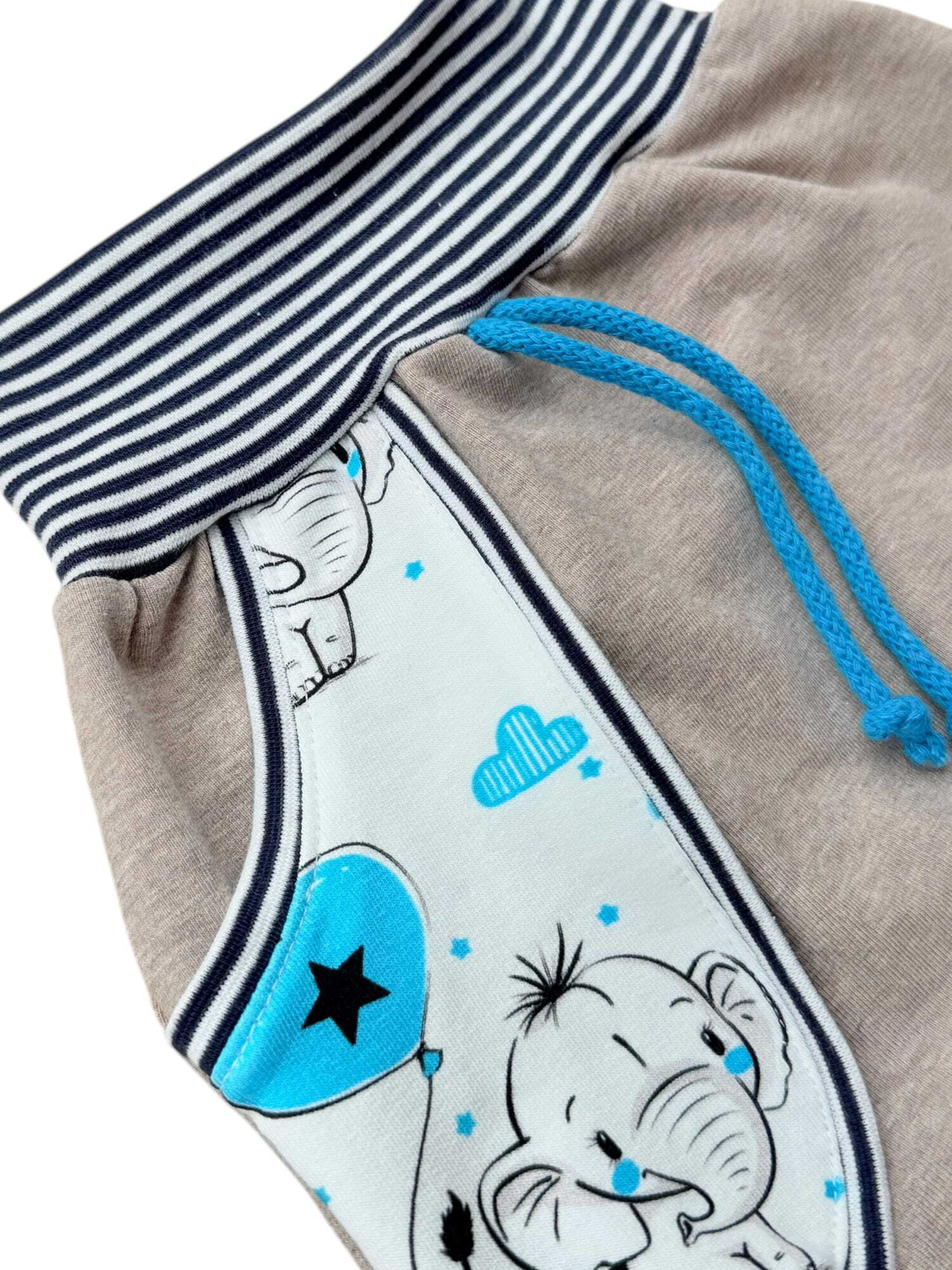 Land-Juwelen Tapered Trousers in Beige