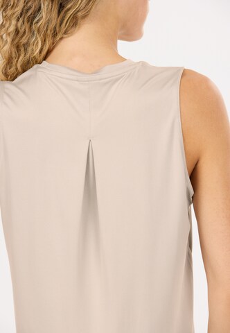 Athlecia Sports top 'Pacy V2' in Beige