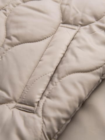 Ombre Tussenjas in Beige