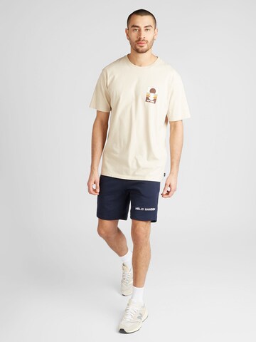 RIP CURL - Camiseta 'SURF REVIVIAL' en beige