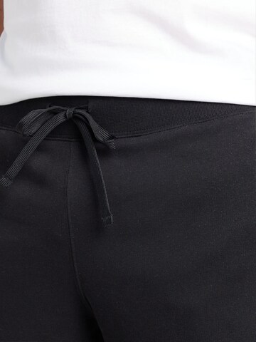 Champion Authentic Athletic Apparel Regular Shorts 'Legacy' in Schwarz