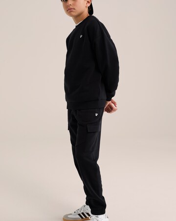 WE Fashion Конический (Tapered) Штаны в Черный