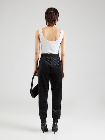 Juicy Couture Tapered Housut värissä musta