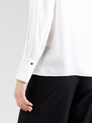 COMMA - Blusa en blanco