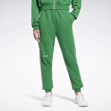 Slimfit Pantaloni sportivi di Reebok in verde: frontale