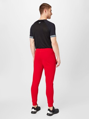 Effilé Pantalon de sport 4F en rouge