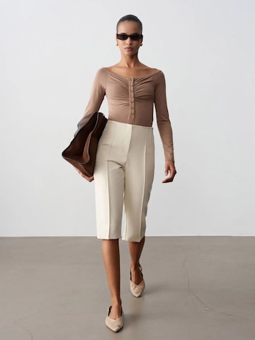 Slimfit Pantaloni con piega frontale di Dilvin in beige