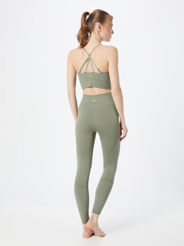 Skinny Pantaloni sportivi 'Nagar' di Athlecia in verde