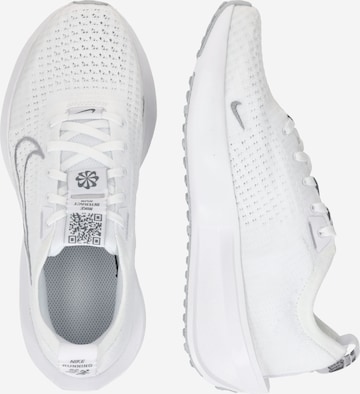 Chaussure de course 'Interact Run' NIKE en blanc