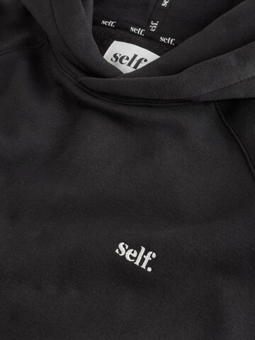 Sweat-shirt self. en noir