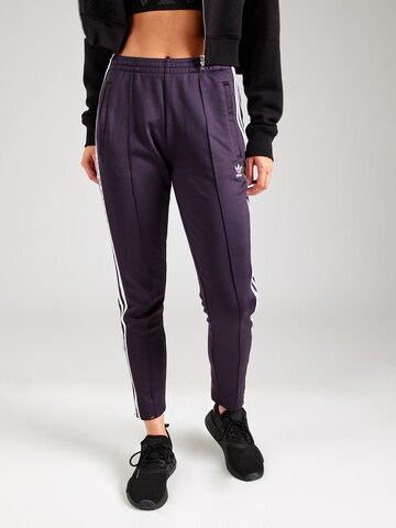 ADIDAS ORIGINALS Слим Штаны 'Adicolor Sst' в Лиловый: спереди