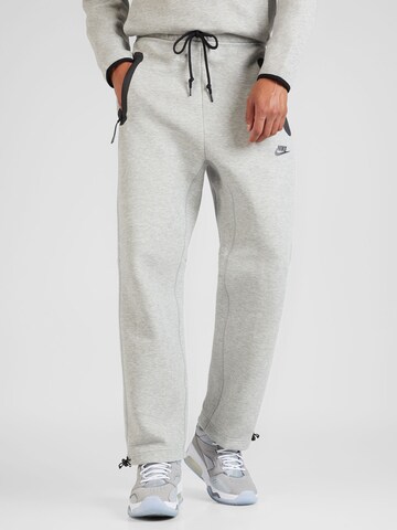 Nike Sportswear - Loosefit Calças 'TECH FLEECE' em cinzento: frente