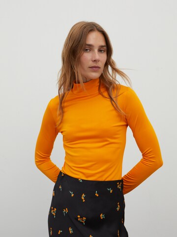 EDITED T-shirt 'Manon' i orange: framsida